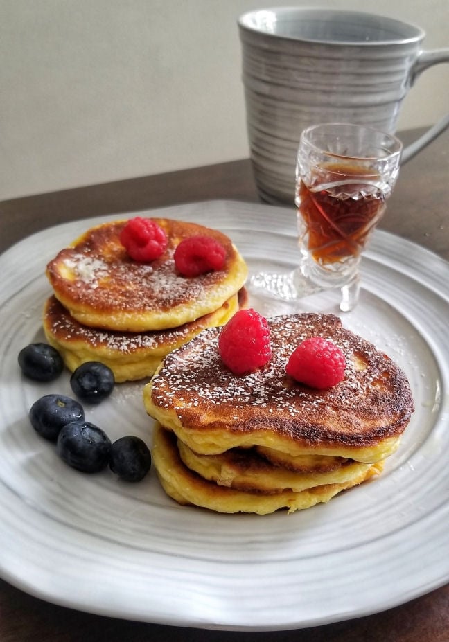 pancakes with fruit and syrup