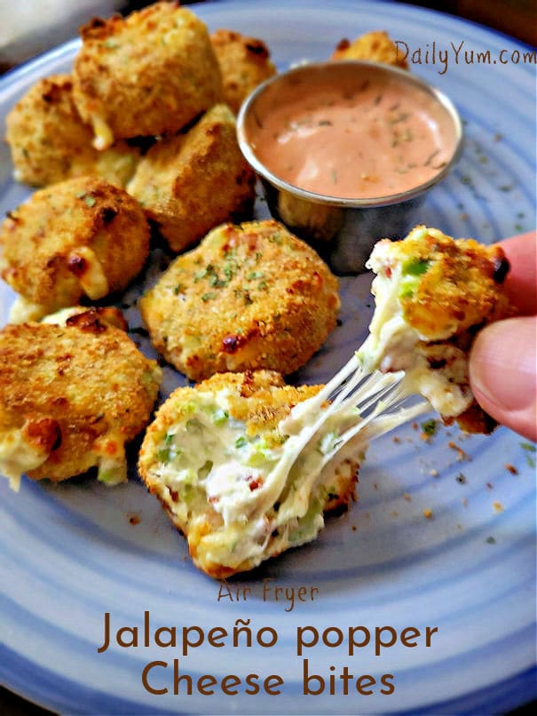 cheesy and gooey jalapeno balls served with a sauce