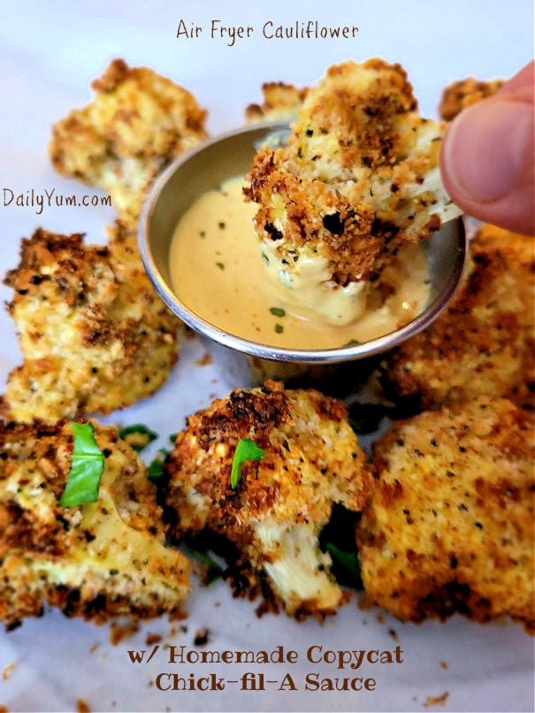 Air fryer roasted cauliflower dipped in Chick-fil-a sauce