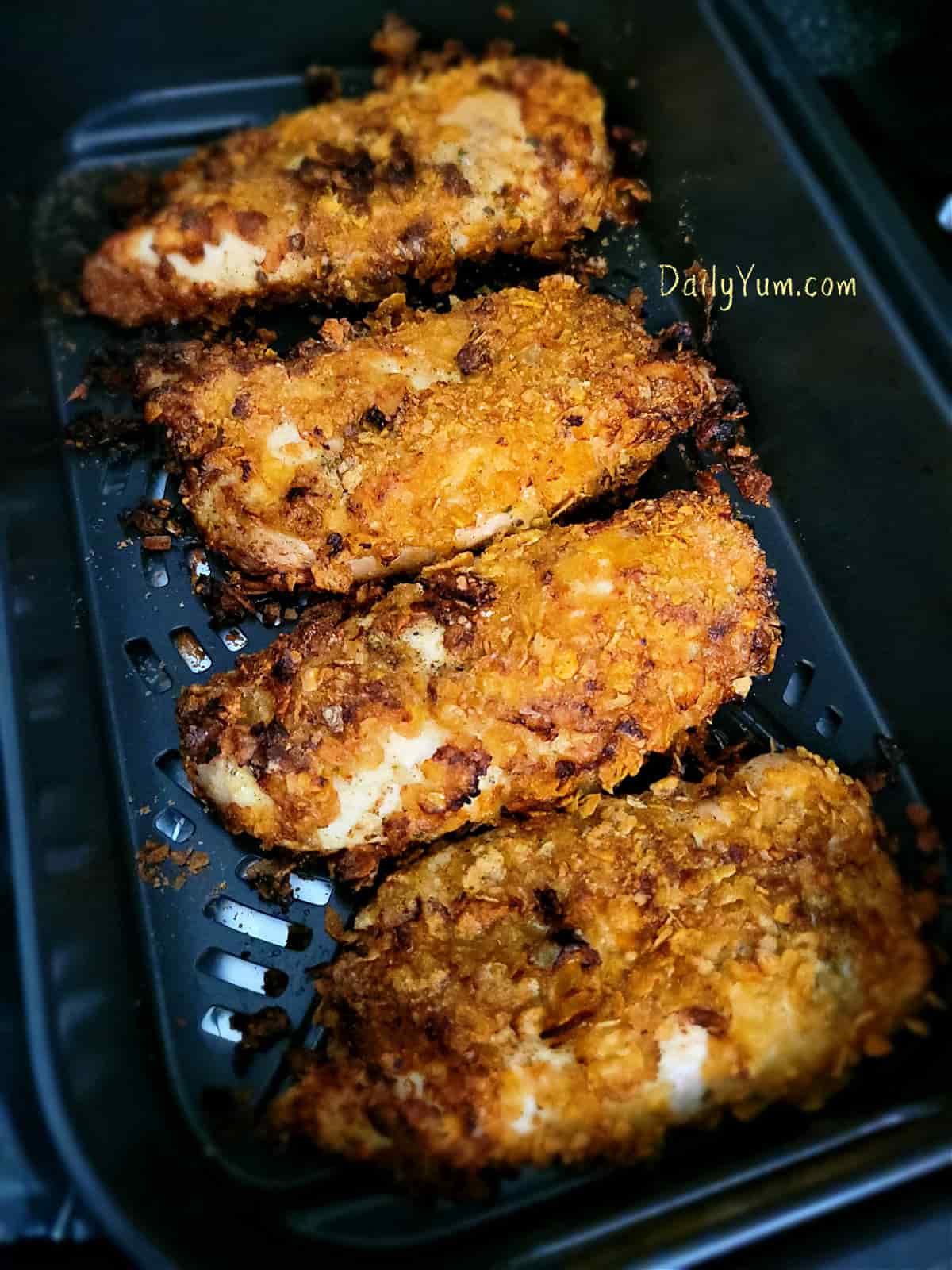chicken breasts coated with cornflakes, cooked in the air fryer