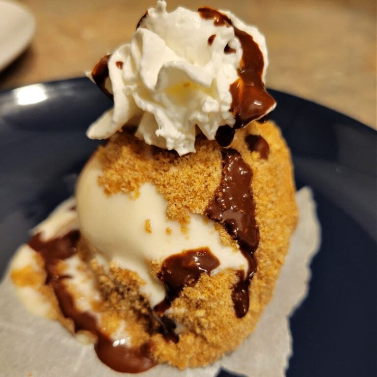 Vanilla ice cream in the air fryer made with crunchy Cinnamon Toast Crunch cereal crumbs