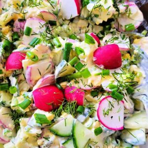 creamy salad with radishes, cucumbers and eggs