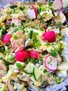 creamy salad with cucumbers and radishes