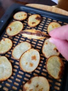 crispy homemade potato chips in the air fryer basket