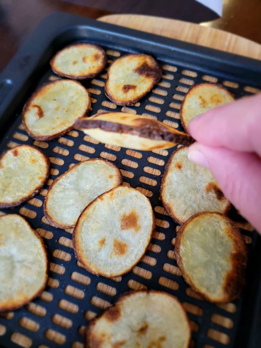crispy homemade potato chips in the air fryer basket