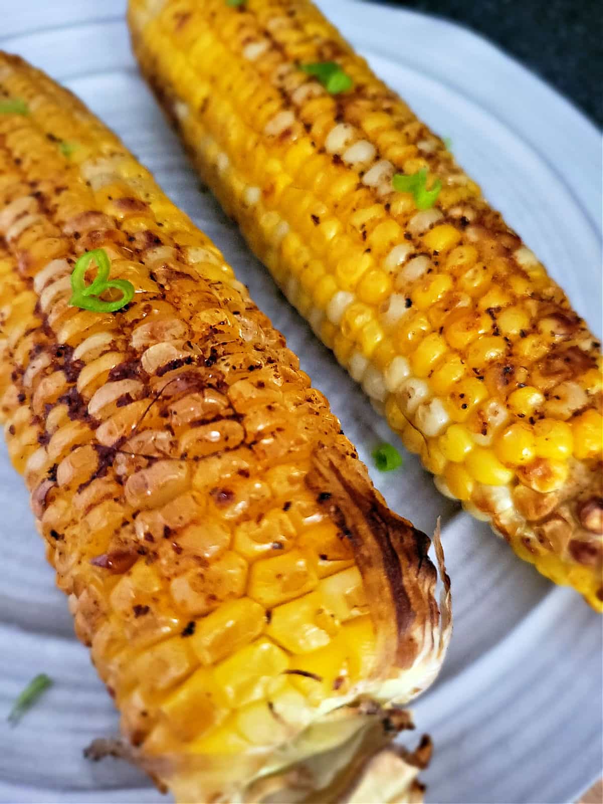 perfectly cooked charred corn on the cob