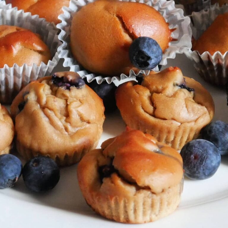 golden brown peanut butter muffins with blueberries