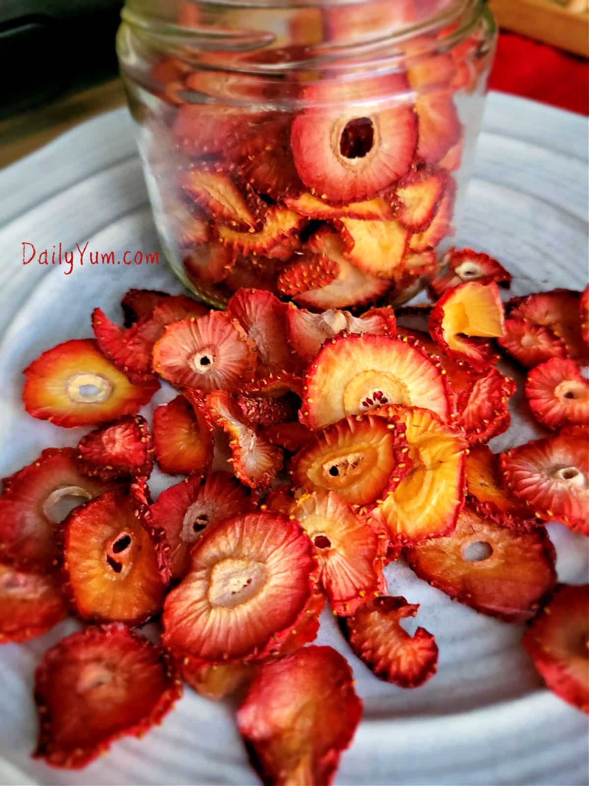 dehydrated strawberries stored in a glass jar