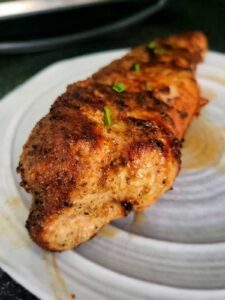 pork tenderloin is being rested for 5 minutes