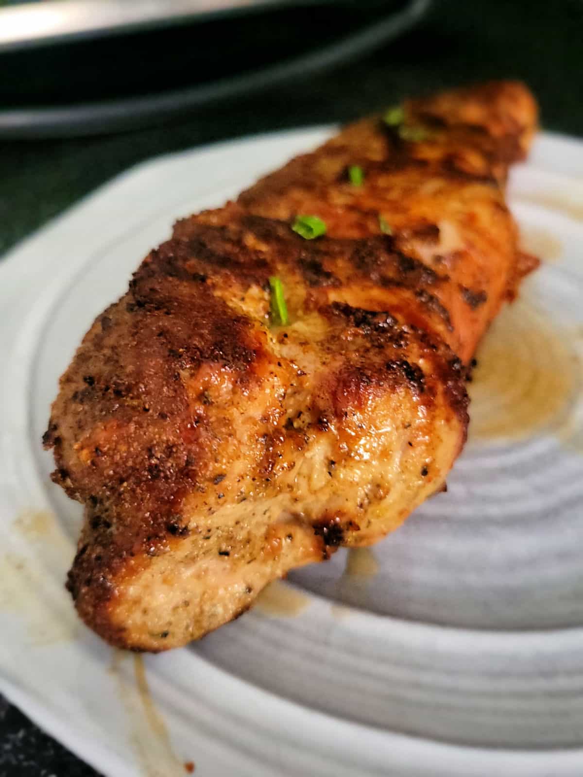 pork tenderloin is being rested for 5 minutes