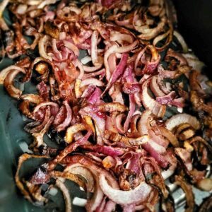 red onions in air fryer basket