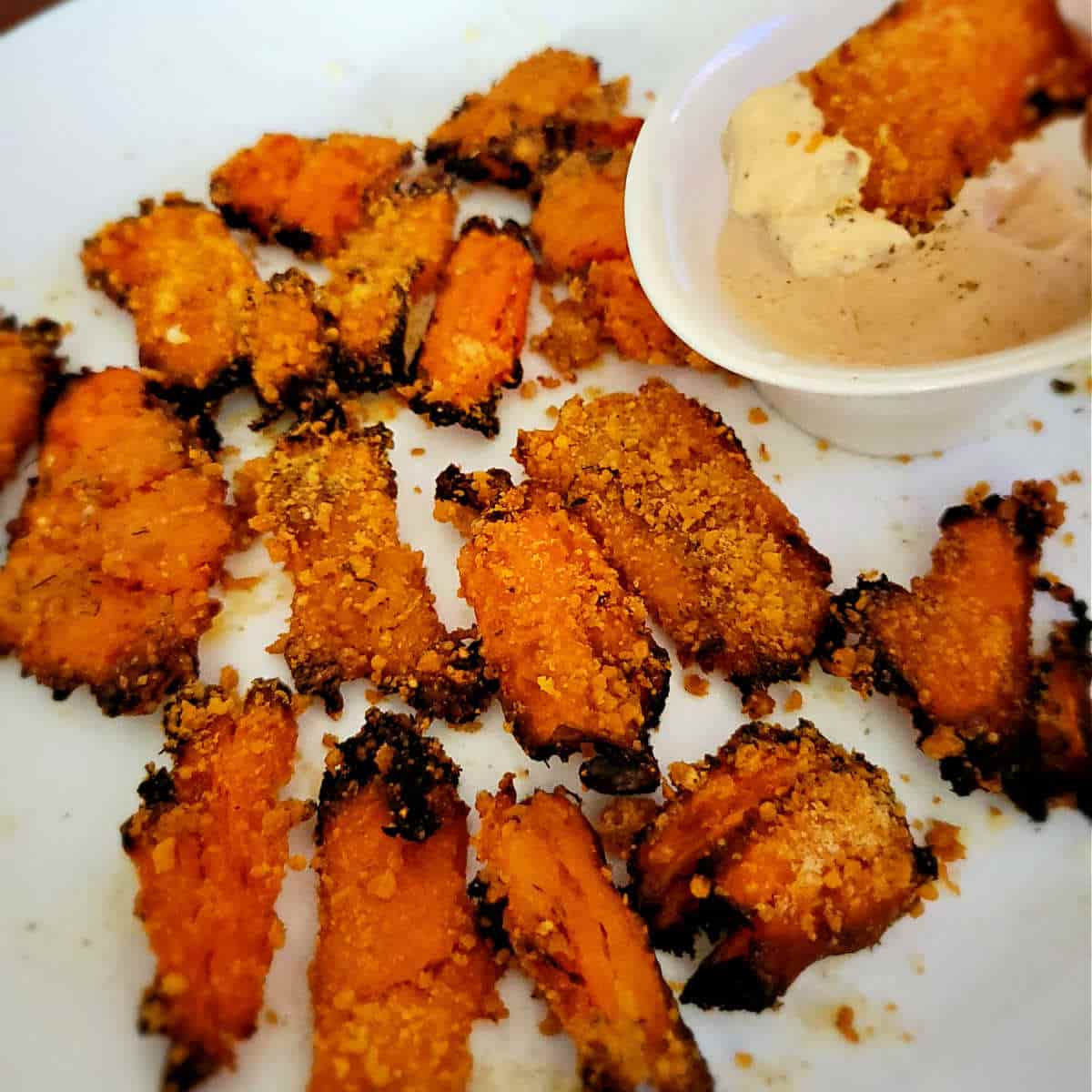 flat carrots with blackened edges