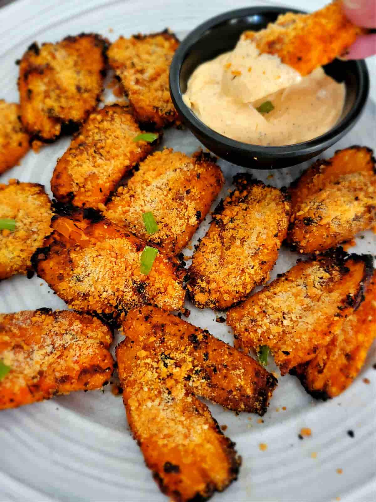 smashed charred carrots with creamy sauce