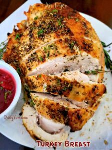 cut up turkey breast with crispy golden brown skin