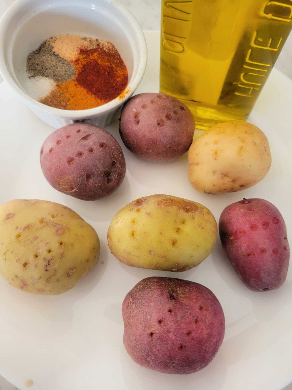 baby potatoes along with olive oil and seasoning