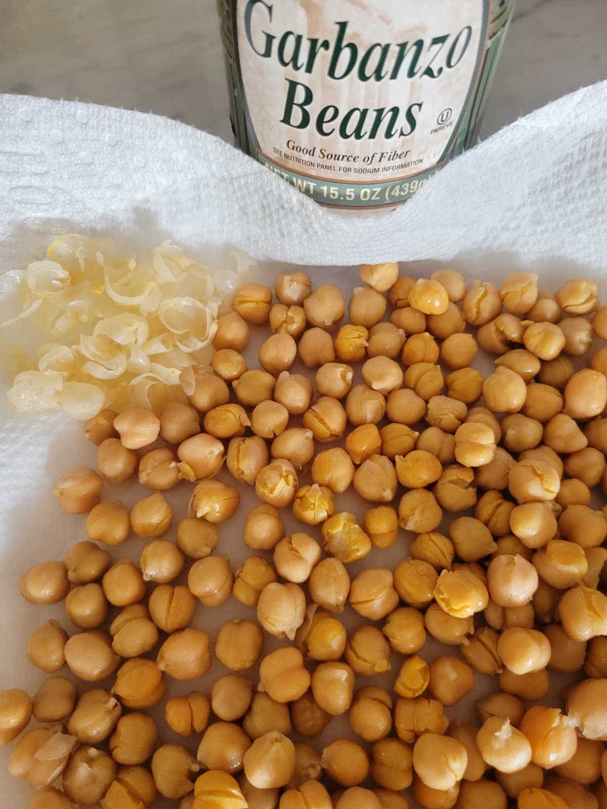 canned chickpeas with translucent shells coming off