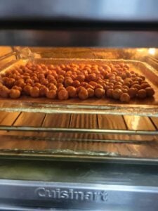 chickpeas on a tray, cooking in the air fryer