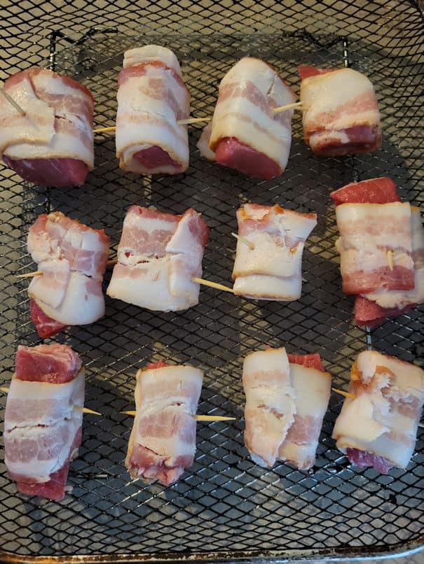 pieces of steak wrapped in bacon and secured with toothpicks