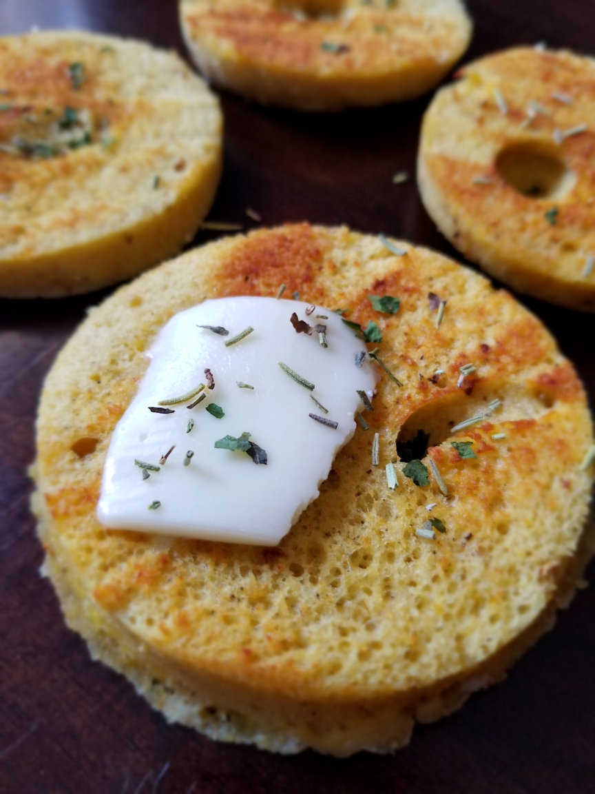 toasted fluffy round bread bun with butter